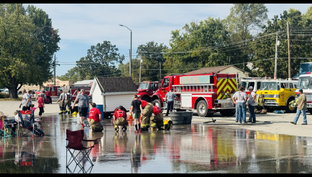 As the end of the day drew near, community members, firefighters, and family and friends enjoyed cooling off in the aftermath of the Bucket Brigade competition! Howell County News/Addison Smith