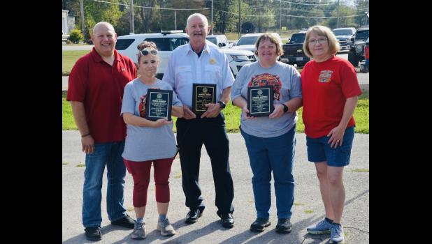 Three Howell County fire service members were recognized for their time in service. Awards were presented to them by Rep. Lisa Durnell (R-154). From left to right: Chris Sterner, Teresa Vanhorn of the Eleven Point Fire Department, 20 years; Randall Dennis of Pomona Fire Department, 11 years as President of Howell County Fire Chiefs and Officers Association Board; Christel Cantrell of the Eleven Point Fire Department, 24 years, Durnell. Howell County News/Addison Smith