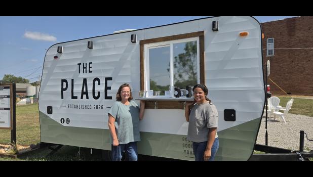Melody Buse (right) and Christine Collins (left) at service window of The Place Drink Co, LLC. Howell County News/ Amanda Mendez