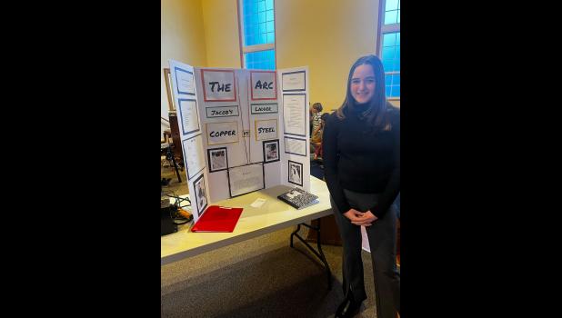 Sally Clevenger, who tested the different metals for conductivity using a Jacob's ladder, tied for second place with her Science Fair entry. photo provided