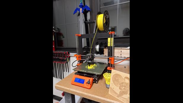 The school’s 3D printer in action Tuesday night during the open house at Innovation Hall. Howell County News/ Amanda Mendez