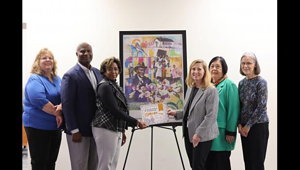 Crockett and Tonya Oaks pictured with Chancellor Zora Mulligan, Carol Silvey, Friends of the Garnett Library member and MSU-WP Staff Emeritus, and Garnett Library staff members Rebekah McKinney, and Neva Parrott. photo courtesy of MSU-WP