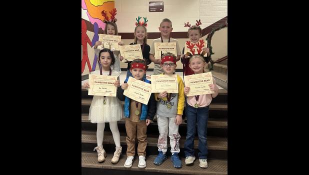 First grade - Front row: Nia Farmer, Greyson McCune, Jett Hilton, and Kinslee Sweat. Back row: Myra Dugger, Neely Wake, Landon Bunch, and Coy Hood. photo provided
