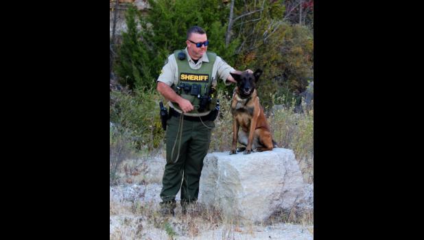 K9 Spice with her handler DFC Robert Malone. courtesy of Howell County Sheriff's Office