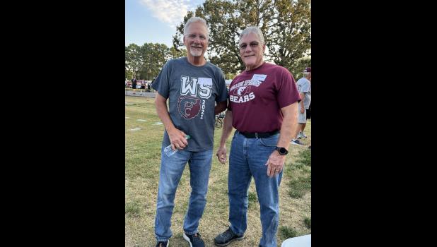 (L-R) Cousins Tim James (WSHS 1973) and Mark James (WSHS 1974), aka the "James Gang," reminiscing at the 100 Years of Bear Celebration before kickoff.