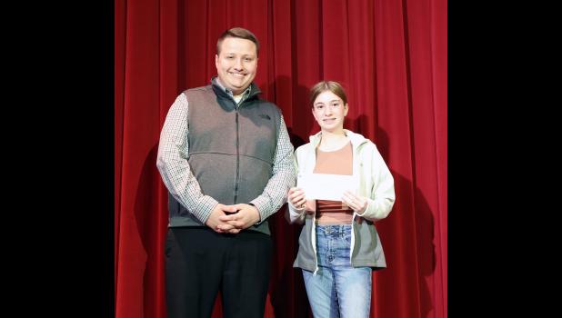 Rose Reeves is congratulated by Missouri State University-West Plains (MSU-WP) Associate Vice-Chancellor for University Communications Dakota Bates. photo provided