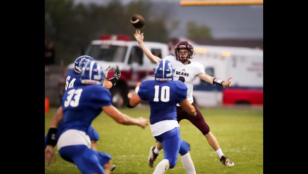 Quarterback Owen Duddridge received a lot of attention from the Bulldogs’ defensive line. (courtesy photo / Sees the Moment Photography)