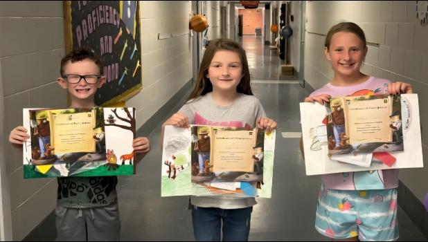 Winners from the Mountain View Elementary are, left to right: Kade Brooks-second grade, Millie Wells-first grade, and Locklynn Harvey-fourth grade. photo provided