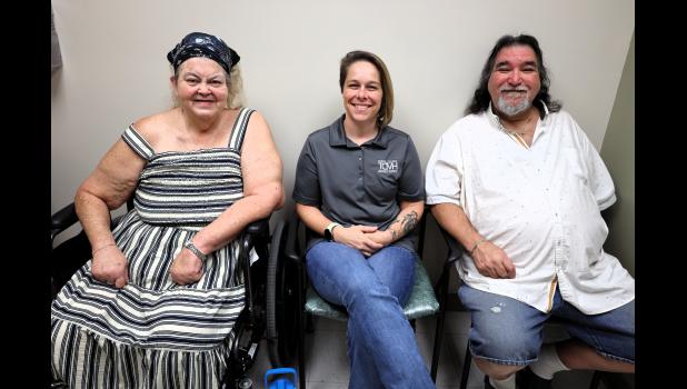 Pictured: Rhonda Nunley, TCMH patient, left; Kristina Grant, DO, family medicine and obstetrics physician, center; and Walter Nunley, TCMH patient, right. photo provided
