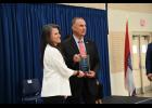 Jennifer Martin, of Willow Springs, receives the Public Safety Civilian Partnership award from Missouri Governor Mike Kehoe in Jefferson City on September 15. photo courtesy of the Missouri Department of Public Safety