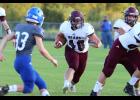 Sophomore Scottie Osborn, no. 40, returned to the football team after missing the season last year. Just like on the basketball court, he wasted no time distinguishing himself as a player to watch. (Photo by Shawana Cox)