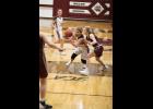 Chloe Chafin driving the lane as the Lady Bears win against Grove in District play. courtesy photo/ Shawana Cox