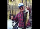 An old Ozark fishing guide, Norten Dablemont, is pictured with a lunker bass caught on a spinner bait. photo provided
